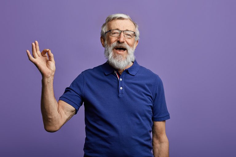 Happy man giving the okay sign with his hand